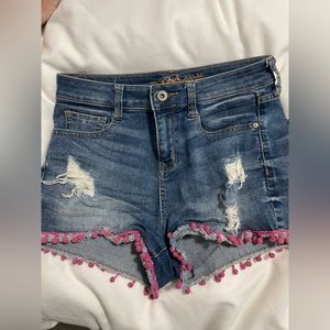 High waisted jean shorts with purple details